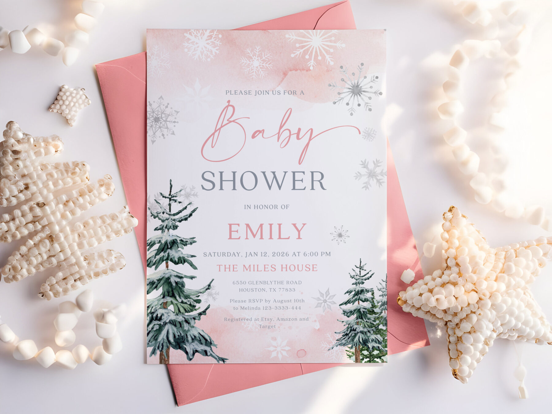 Pink Winter Baby Shower Invitation. Blush winter colors, evergreen trees and baby shower wording.
