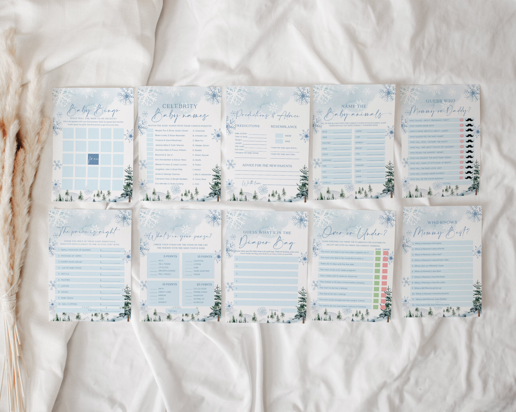 Blue Winter Baby Shower Games Bundle - Canva Templates shown in a styled product mockup.