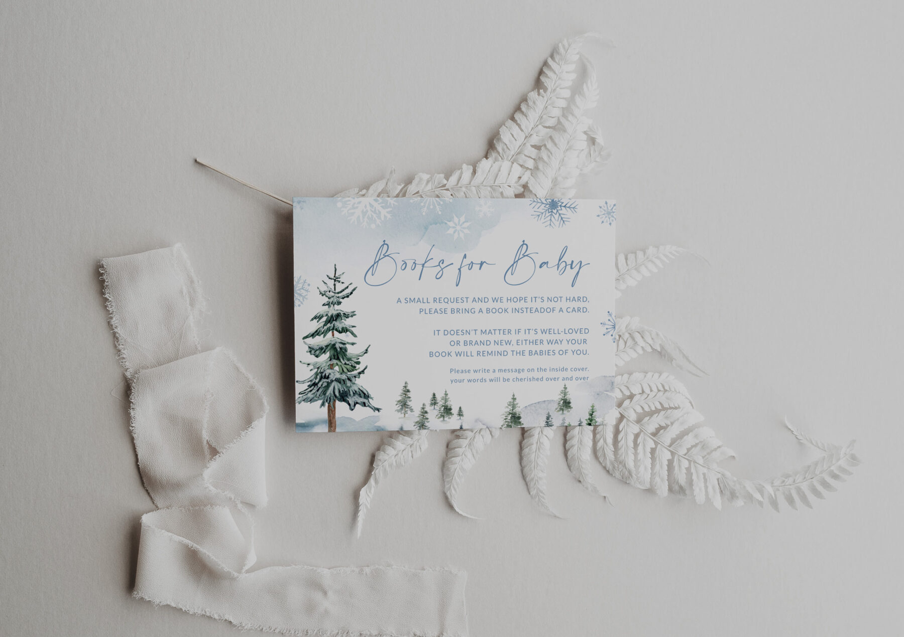 Blue Winter Books for Baby Card - Canva Template shown in a styled product mockup.