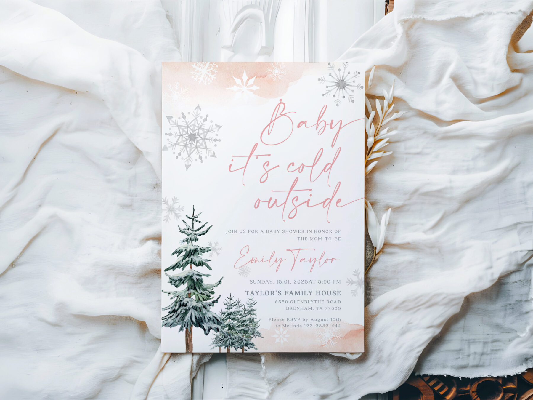 Pink Winter Baby It's Cold Outside Invitation - Canva Template shown in a styled product mockup.