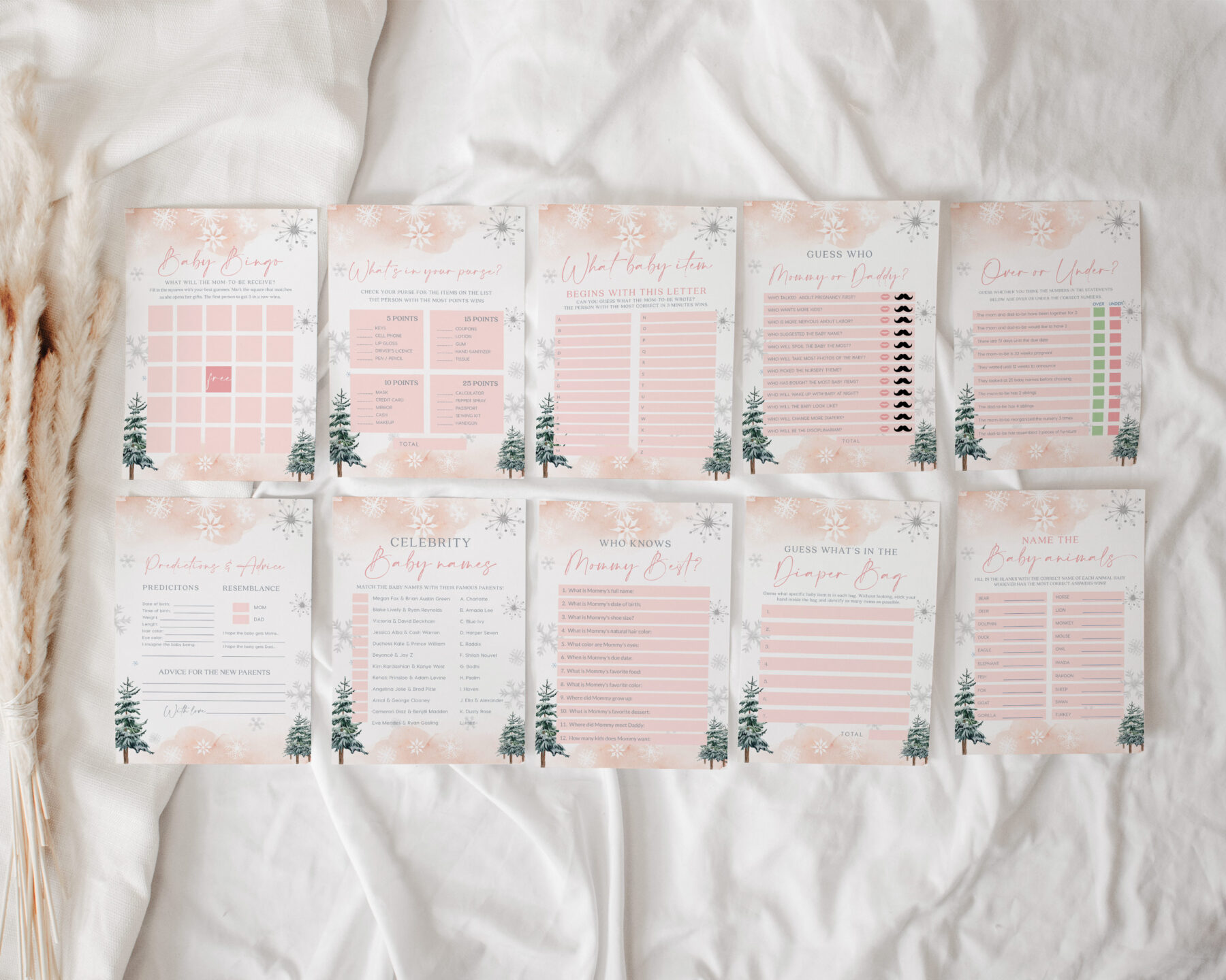 Pink Winter Baby Shower Games Bundle - Canva Templates shown in a styled product mockup.