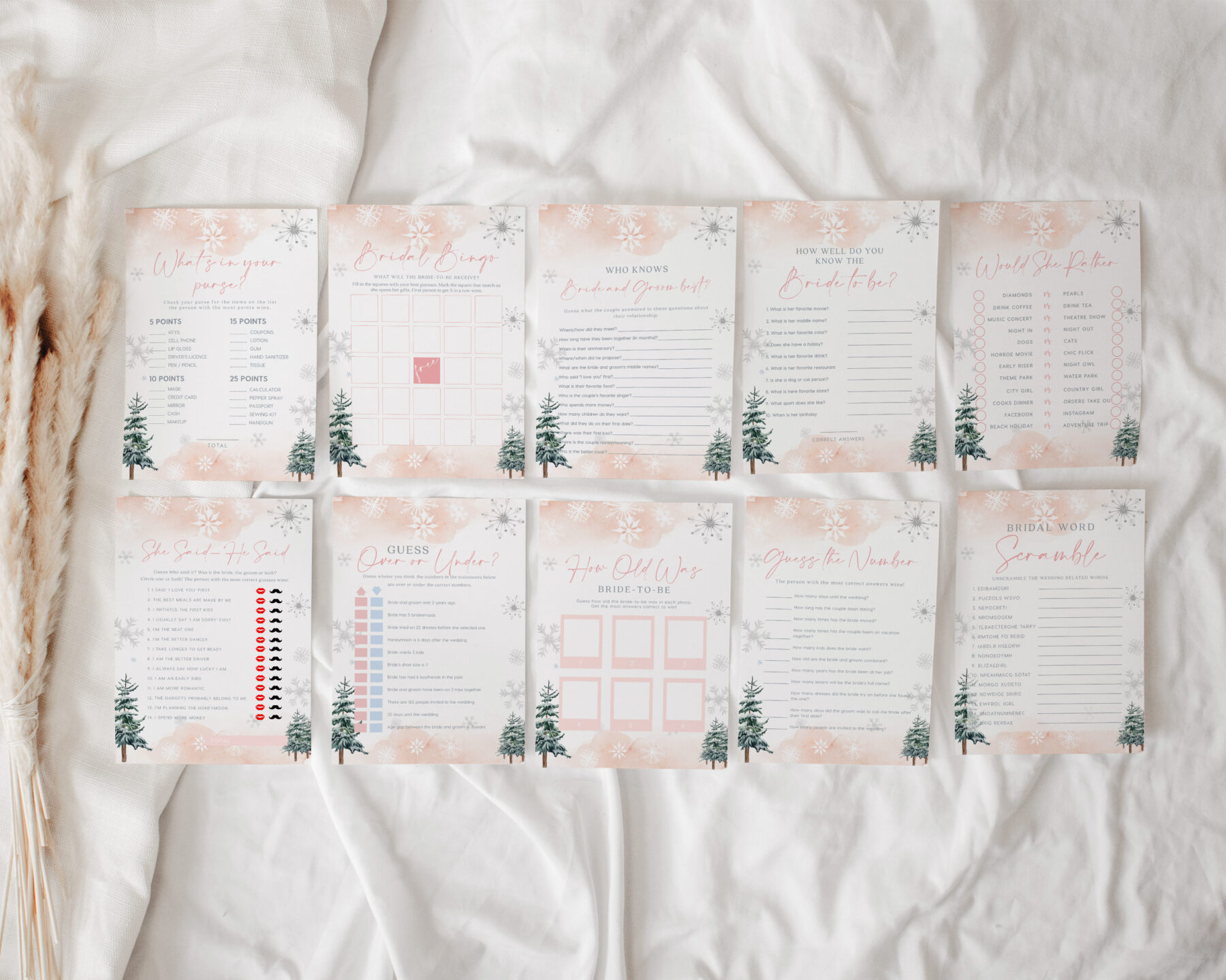 Pink Winter Bridal Shower Games Bundle - Canva Templates shown in a styled product mockup.
