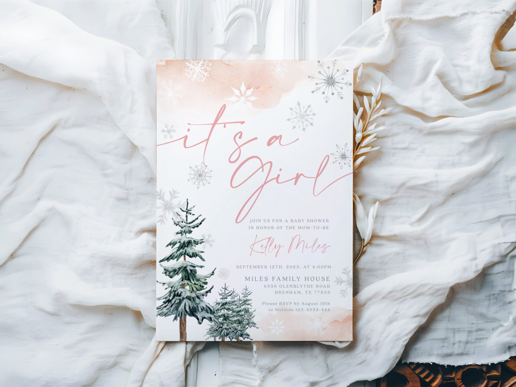 Pink Winter It's a Girl Invitation - Canva Template shown in a styled product mockup.