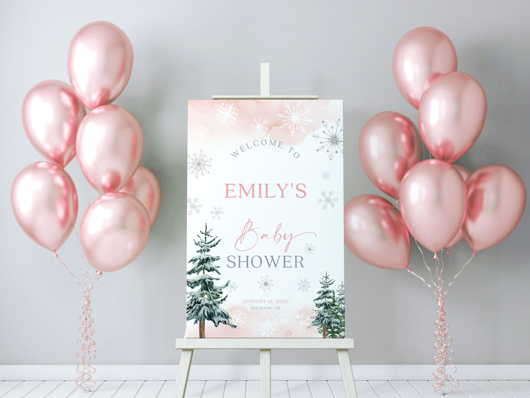 Pink Winter Baby Shower Welcome Sign - Name-First shown in a styled product mockup.